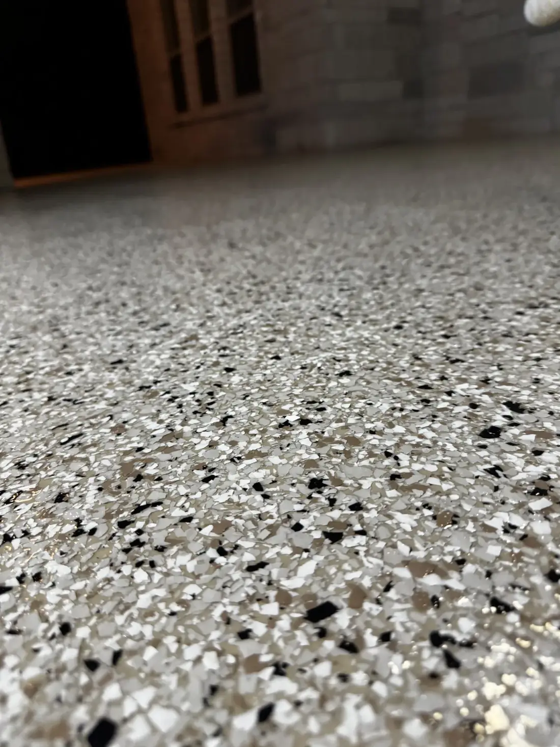Newly coated garage floor photographed at dusk