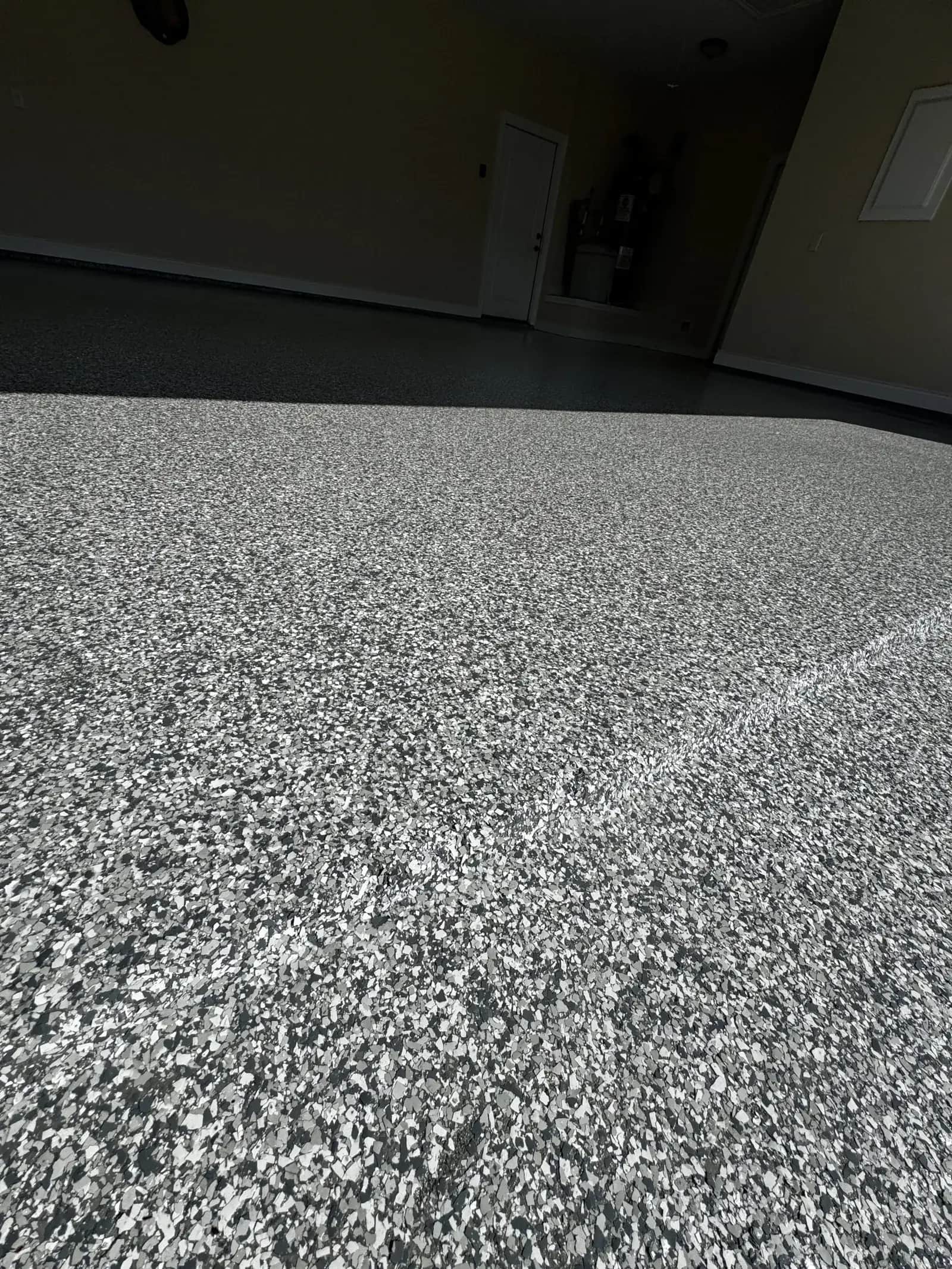 Close-up of a finished flake epoxy floor