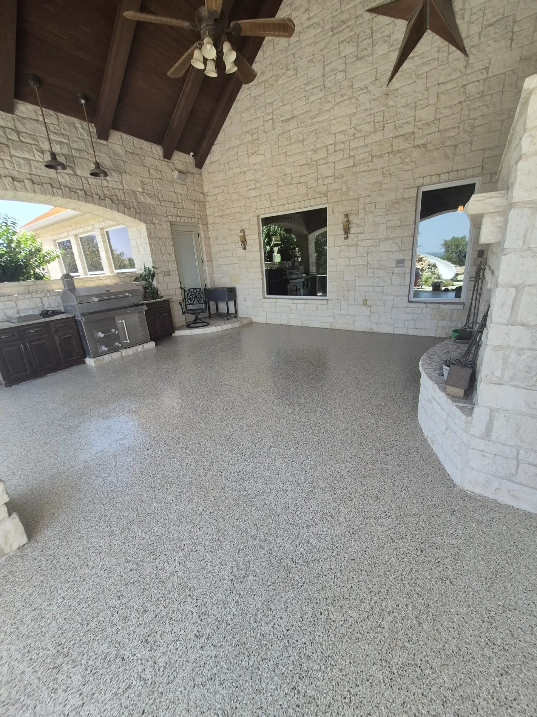 Covered patio with a textured decorative concrete coating