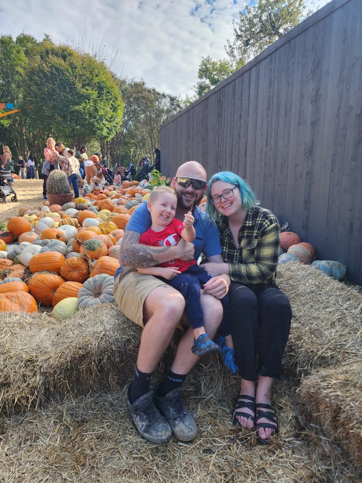 Tony Bolin, founder of Blupoxy Coatings, with family at a pumpkin patch