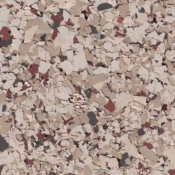Abstract pattern featuring randomly scattered, multicolored flakes with shades of beige, white, and red, resembling a textured, stone-like surface.