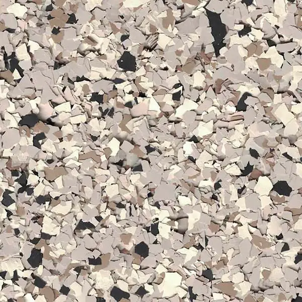 A scattered mix of beige, white, and gray flakes creates an abstract pattern resembling a terrazzo floor, with various shapes and sizes.
