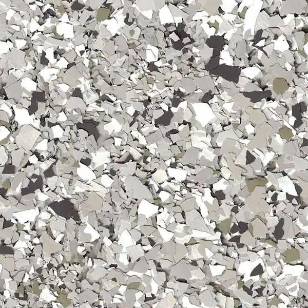 A grayscale abstract image featuring an intricate pattern of irregular, jagged shapes resembling broken pieces scattered randomly across the entire surface.