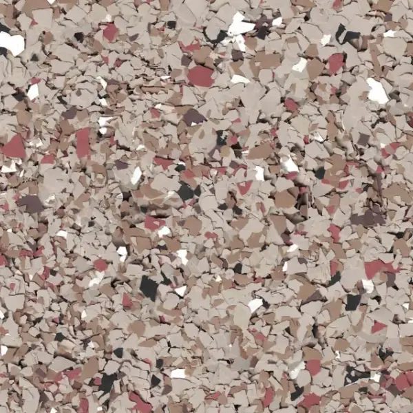 The image shows a textured surface of multicolored, irregularly shaped flakes in beige, red, brown, and black tones.