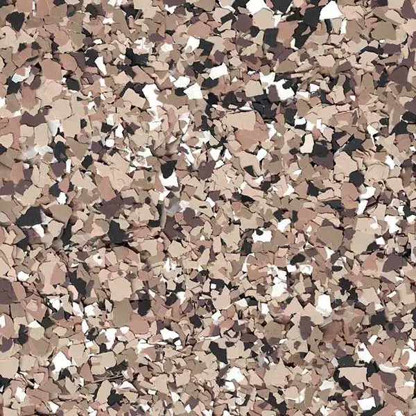 The image shows an abstract pattern of small, irregularly shaped pieces in various shades of brown, black, and white, resembling camouflage.